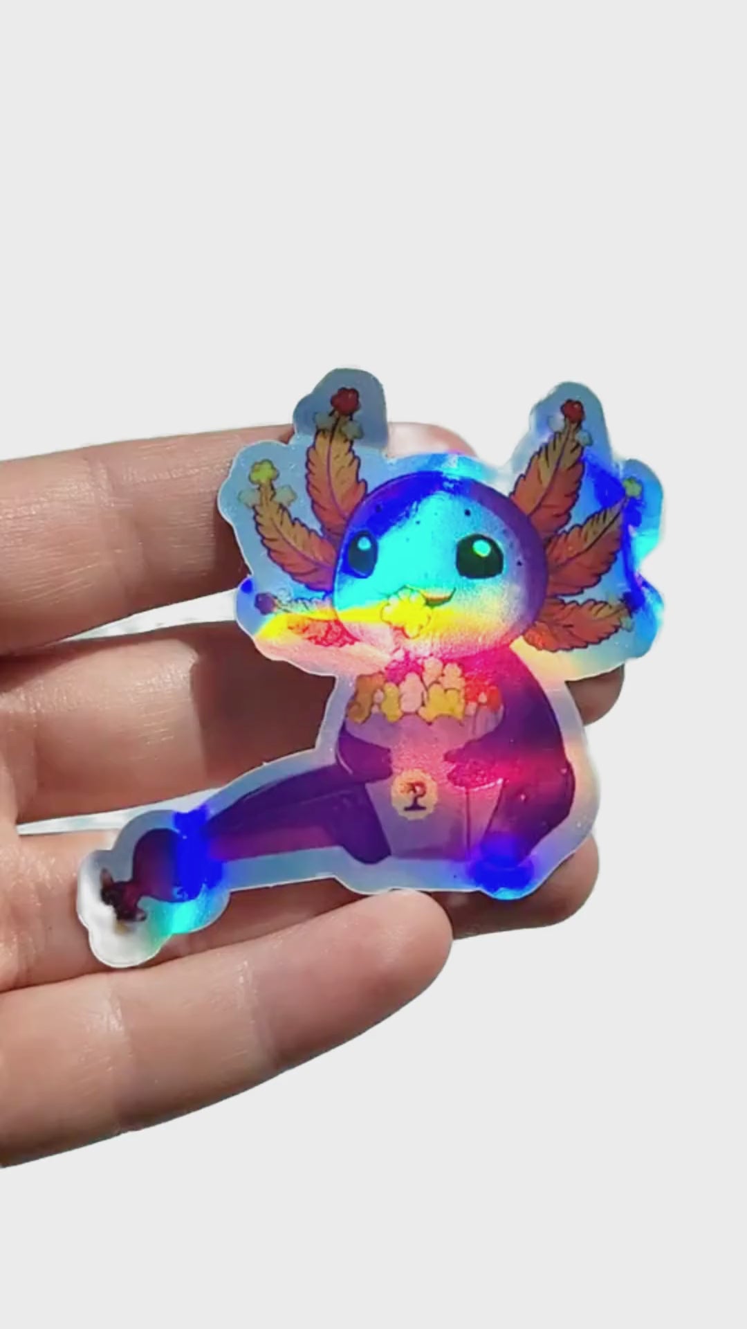 Vidéo sticker holographique axolotl gourmand Souna - Popcornarium